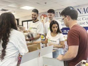 NVIDIA employees packing unique food baskets for Rosh Hashanahfood baskets